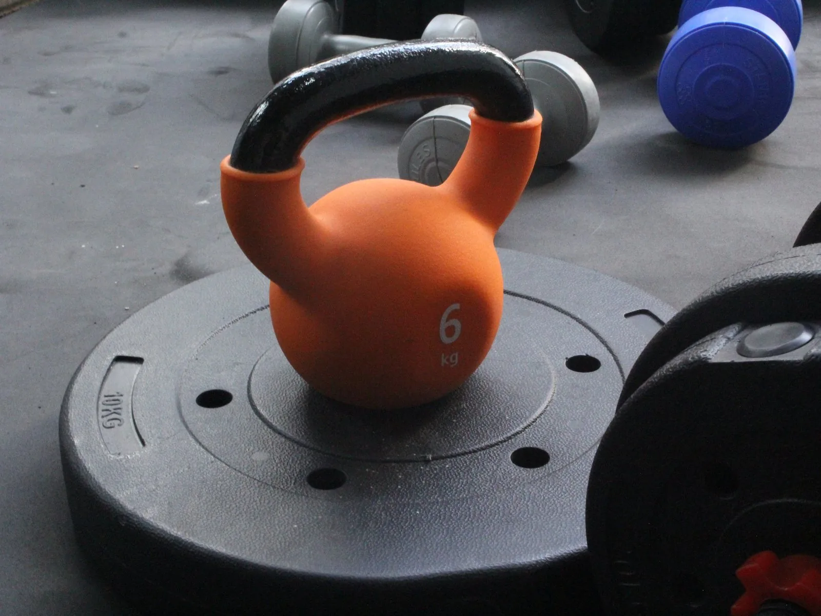 Kettlebell and gym weights, representing a future NatFitPT client success story